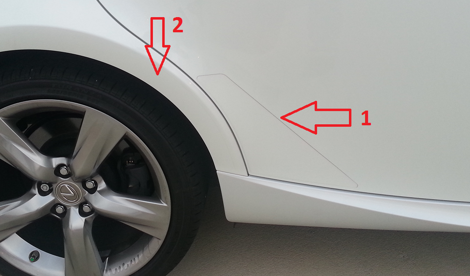 Protective film on rear doors and around wheel well -- Remove it