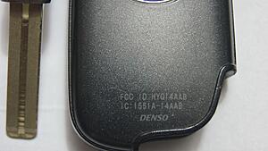 ISX50 Smart key fob + Uncut blank key-ql0mtoo.jpg