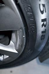 One of those days, Rim against the curb on new GS, hope it can be repaired.-rear-wheel-1.jpg