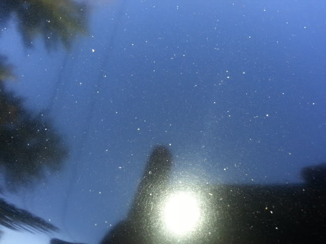 Streaks 2 days after waxing a black car. How do I fix this? The