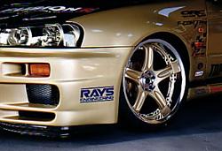 Gold rims on white-r34_gtcwheels.jpg