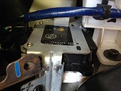 What is this thing behind the glovebox?-photo.jpg