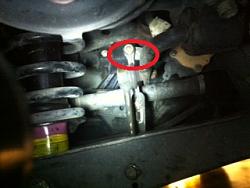 Help! Headlight level on after replacing four struts-photo-2-.jpg