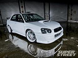 my other car was in SUPERSTREET last month ..(PIX)-130_0901_20_z-2005_subaru_wrx_sti-front_quarter_view.jpg