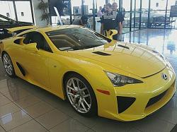 I saw the beast !!!!!!! Bright yellow Lexus LFA-297158_236658276369594_100000762696587_602927_2840594_n.jpg