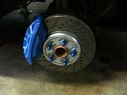 Brake Pad &amp; Rotors for a UCF20-brakes-and-lug-nuts.jpg