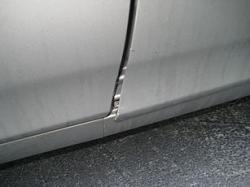 Lower corner of door panel separating-img_0297.jpg