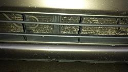 AC Condenser Rock Damage-20140218_174514.jpg