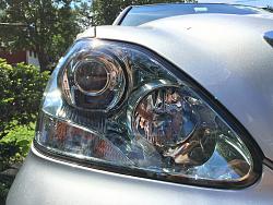 Got one headlamp replaced, now car looks odd. Any way to clean up old one?-new.jpg