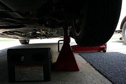 DIY - Disk Brake Removal and Sanding with Garnet Paper to resolve Brake Problem.-image-3-jack-stand-and-wheel-ramp..jpg