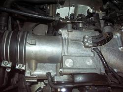 High cold-start idle, normal warm idle, rich/gas smell-small-top-manifold.jpg