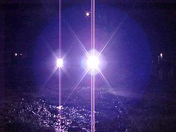 Headlight bulb replacement-front-both-lights-distant-purple-star.jpg