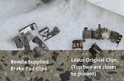 Rear caliper replacement-brake-pad-clips-new-and-old.png