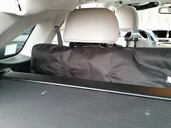 Retractable cargo cover question-flap-attached-to-rear-seat-headrest-1024x768-.jpg