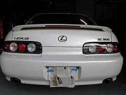 Tail lights-painted-emblems-1.jpg