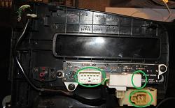 Wires under the center console cup holder - See picture-one.jpg