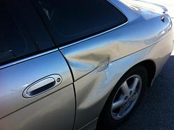 small dent, car is totaled-photo-1-.jpg