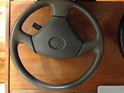 Three PERFECT Steering Wheels. 2 Three Spoke, One Black, One Tan. 1 Four Spoke ,Black-tan-solo.jpg