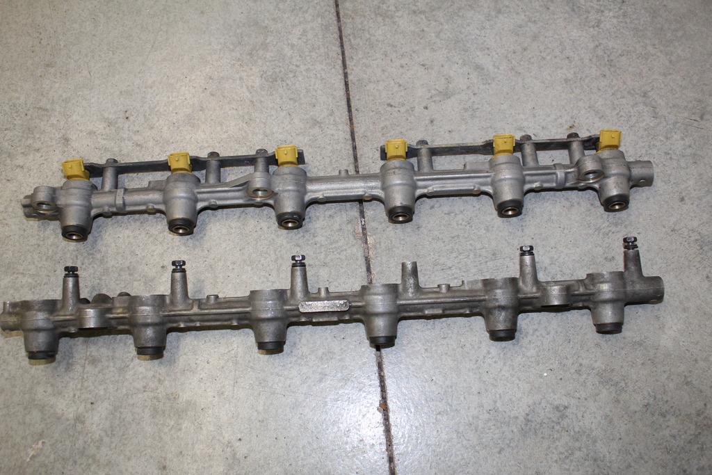 Name:  oem%201jz%20injectors%20extra%20fuel%20rail_zpscyseenpr.jpg
Views: 714
Size:  259.2 KB