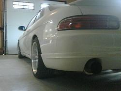 JDM wheels for sale-shot-of-the-back-left-tailight-in-garge-shows-dish-and-exhaust.jpg