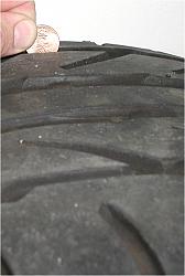 Bridgestone S0-3's 275/30/19-old-tire-penny.jpg