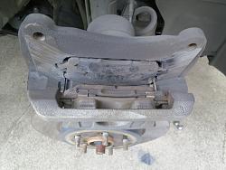 Brake pads bent/broken...what happened?-img_1343.jpg