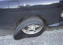 My tire blew out this morning *pic*-blowout.jpg