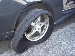 My tire blew out this morning *pic*-blowout2.jpg